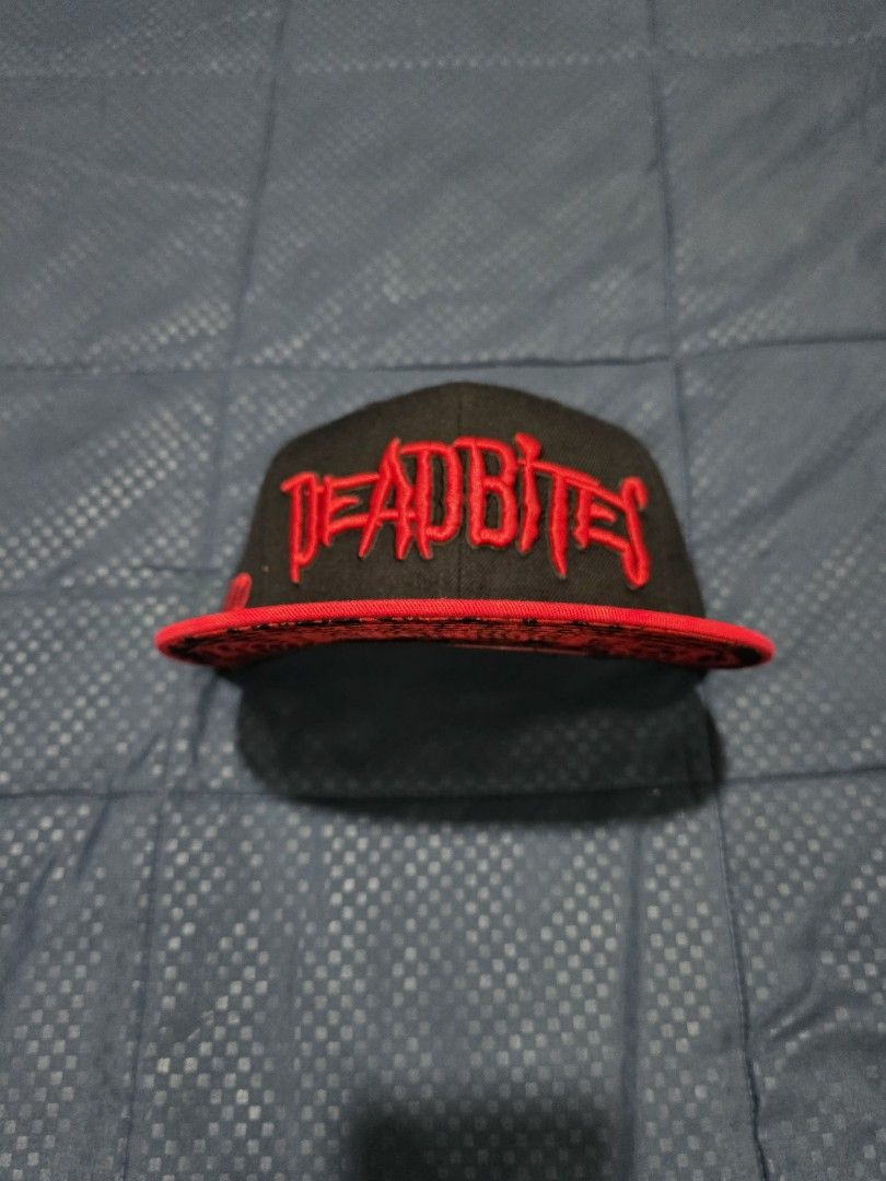 Deadbites Black Red Embroidered Snapback Hat (Category: Caps & Hats) located in Santa Rosa. Submitted by wel3993 (Listing ID 1462316170, Image 2). Description: deadbites cap Brandnew 1000 MOD. LBC MOP. BDO, GCASH LOC. NUEVA ECIJA - Black snapback hat - Red Deadbites embroidery on front and side - Red and black graphic print on underside of brim - Deadbites Clothing branding inside - Original tags attached - Unique collectible piece.