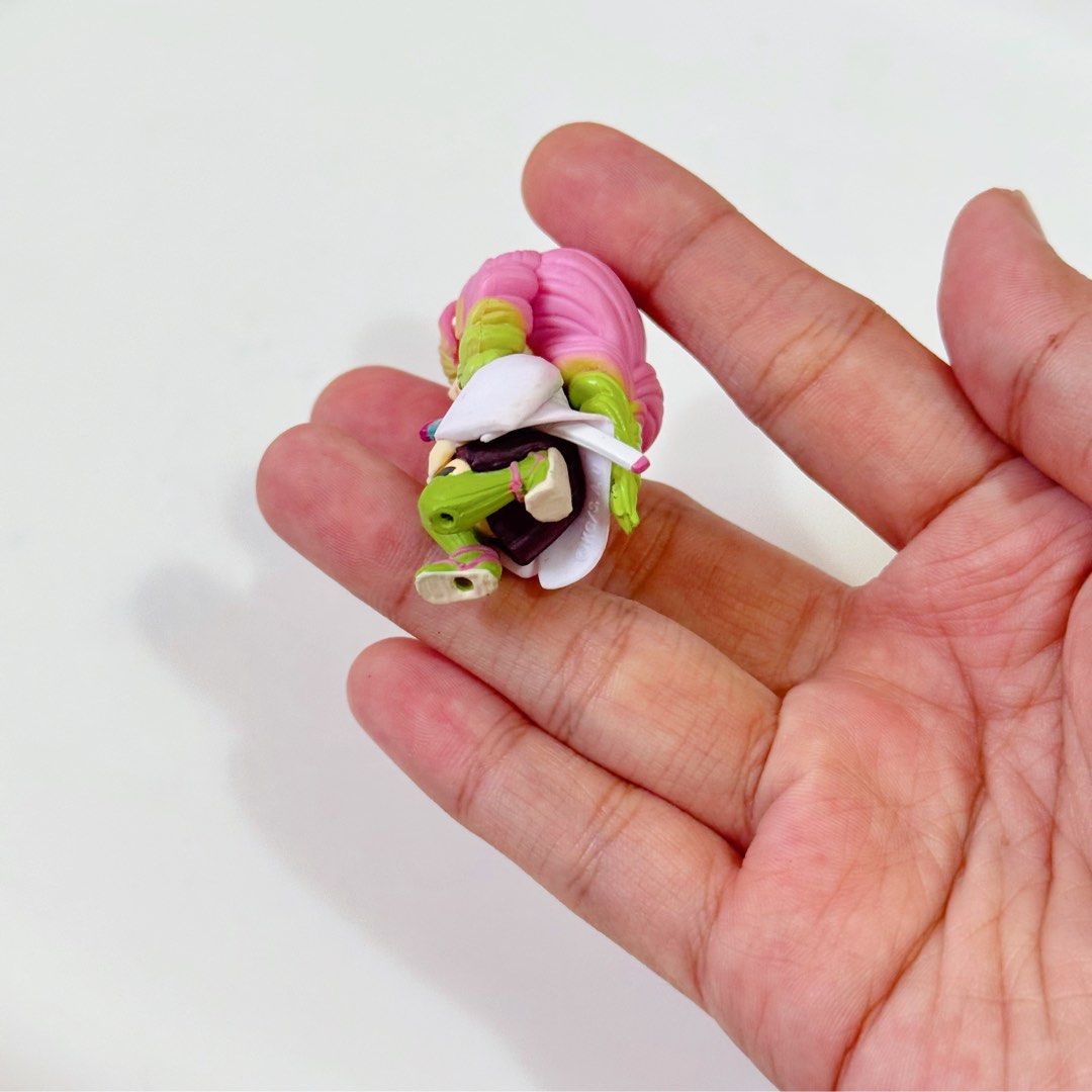 Demon Slayer “Mitsuri Kanroji” Mini Figure (Category: Figurines & Statues) located in Manila. Submitted by ashyyel_ (Listing ID 1462432159, Image 3). Description: no standee - no markings.