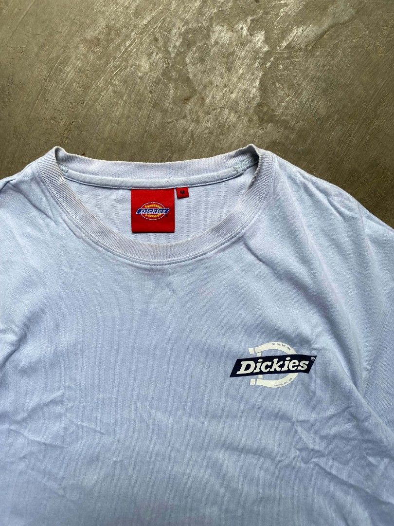 DICKIES LIGHT BLUE AESTHETIC SHIRT (Category: Tshirts & Polo Shirts ) located in Cabanatuan. Submitted by vivian_nicole_03 (Listing ID 1462434056, Image 3). Description: - Light blue Dickies Fairlawn T-Shirt featuring a small horseshoe graphic logo on the chest and a woven brand label near the hem - Dimensions ( 21x27 ) - Condition ( Good ) - Issue ( None ) - Price ( 549 ) + ( Shipping fee).