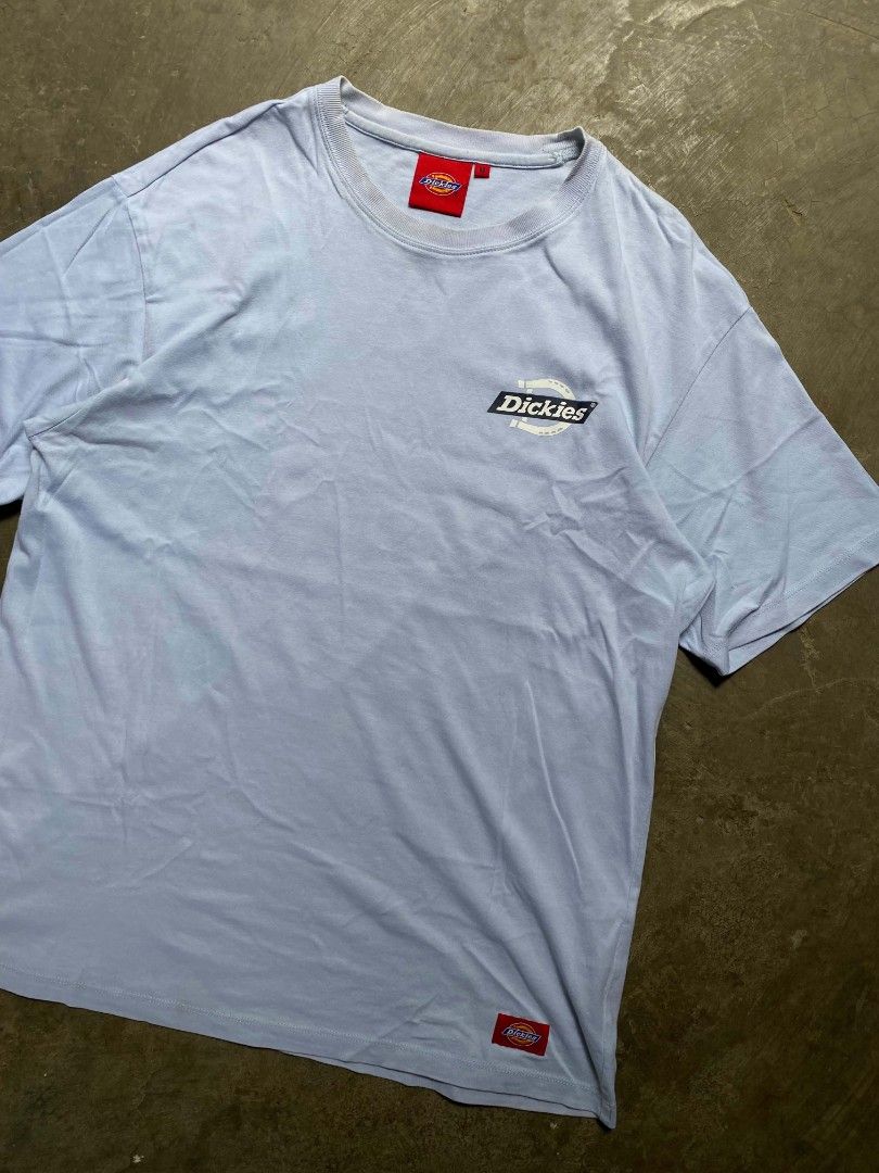 DICKIES LIGHT BLUE AESTHETIC SHIRT (Category: Tshirts & Polo Shirts ) located in Cabanatuan. Submitted by vivian_nicole_03 (Listing ID 1462434056, Image 2). Description: - Light blue Dickies Fairlawn T-Shirt featuring a small horseshoe graphic logo on the chest and a woven brand label near the hem - Dimensions ( 21x27 ) - Condition ( Good ) - Issue ( None ) - Price ( 549 ) + ( Shipping fee).