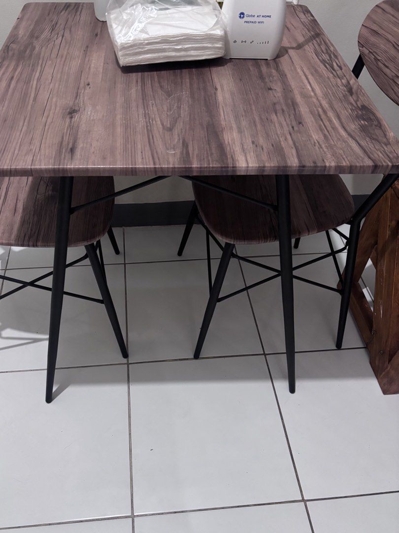 Dining Table Set for 2 (Category: Tables & Sets) located in Marikina City. Submitted by xiaomijia (Listing ID 1462317378, Image 2). Description: Dining table with two chairs Material: metal frame and MDF. Weight limit: 80kgs Price non-negotiable. You can buy as a set with day bed w/ discount (shown in photos). RFS: not used anymore. Condition is still good but you may need to clean it as it’s been in storage for a while. Used only for 1yr+. Table