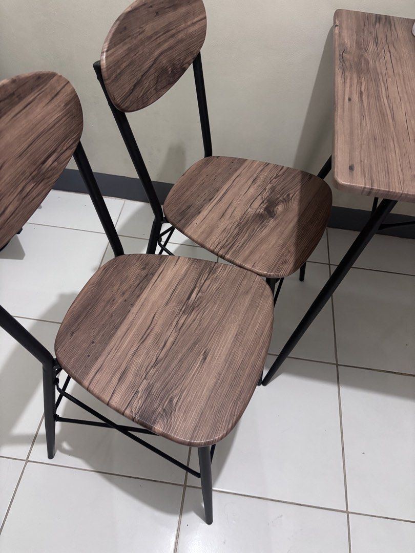 Dining Table Set for 2 (Category: Tables & Sets) located in Marikina City. Submitted by xiaomijia (Listing ID 1462317378, Image 3). Description: Dining table with two chairs Material: metal frame and MDF. Weight limit: 80kgs Price non-negotiable. You can buy as a set with day bed w/ discount (shown in photos). RFS: not used anymore. Condition is still good but you may need to clean it as it’s been in storage for a while. Used only for 1yr+. Table