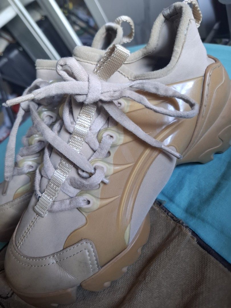 Dior Sneakers - Beige/Tan (Category: Sneakers) located in Marikina City. Submitted by bags21.ph (Listing ID 1462437925, Image 3). Description: - Authentic Dior sneakers - Chic beige and tan colorway - Classic lace-up design - Dior logo detail on the sole - Ideal for everyday casual outfits.