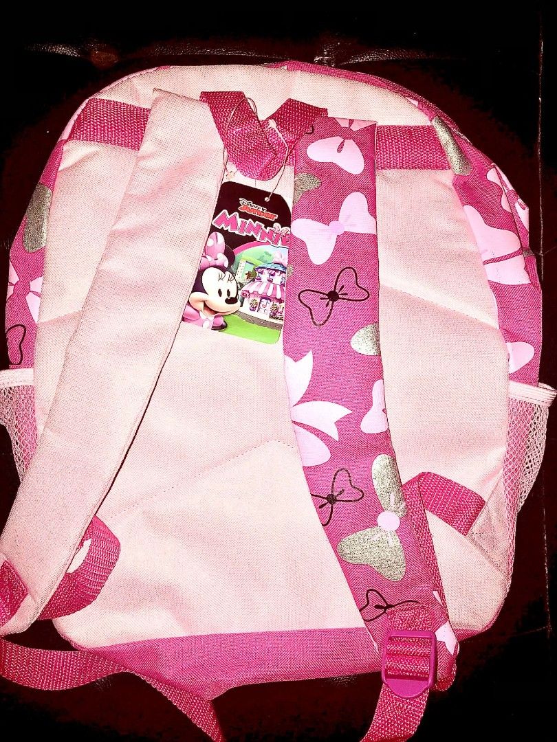 Disney Minnie Mouse Pink Hearts Backpack (Category: Babies & Kids Fashion) located in Rizal. Submitted by youngwolf-5f02 (Listing ID 1462303231, Image 2). Description: - Adorable pink Minnie Mouse backpack - Features rainbow "Rainbow Beautiful Pink Hearts design" - Clear front pocket with a sparkly bow inside - Side mesh pockets for water bottles - Adjustable padded straps for comfort - Ideal for school, daycare, or travel - Officially licensed D