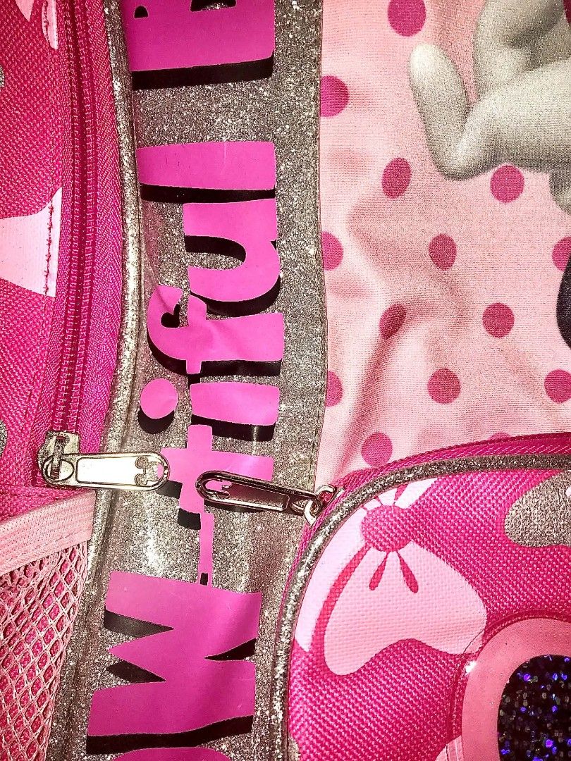 Disney Minnie Mouse Pink Hearts Backpack (Category: Babies & Kids Fashion) located in Rizal. Submitted by youngwolf-5f02 (Listing ID 1462303231, Image 3). Description: - Adorable pink Minnie Mouse backpack - Features rainbow "Rainbow Beautiful Pink Hearts design" - Clear front pocket with a sparkly bow inside - Side mesh pockets for water bottles - Adjustable padded straps for comfort - Ideal for school, daycare, or travel - Officially licensed D