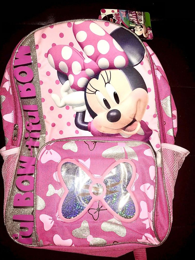 Disney Minnie Mouse Pink Hearts Backpack (Category: Babies & Kids Fashion) located in Rizal. Submitted by youngwolf-5f02 (Listing ID 1462303231, Image 1). Description: - Adorable pink Minnie Mouse backpack - Features rainbow "Rainbow Beautiful Pink Hearts design" - Clear front pocket with a sparkly bow inside - Side mesh pockets for water bottles - Adjustable padded straps for comfort - Ideal for school, daycare, or travel - Officially licensed D