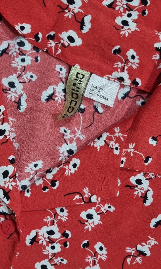 Divided by H&M blouse (Category: Blouses) located in San Jose del Monte. Submitted by angelsnest (Listing ID 1462360243, Image 3). Description: Made in china 100% polyester, non-stretch Small on tag, 22"W x 27"L with extra button padala from Japan rfs: not my style Gcash,Maya, Bank transfer.