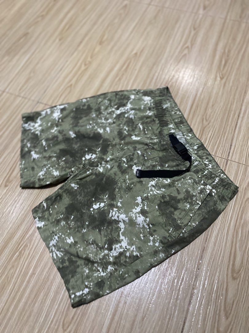DNWR Camo Cargo Shorts (Category: Shorts) located in Davao. Submitted by jayelcarba61168 (Listing ID 1462277375, Image 1). Description: - Trendy green and white tie-dye pattern - Comfortable elastic waistband with adjustable black buckle strap - Two functional back pockets with a small tag detail - Relaxed fit, ideal for everyday casual wear.