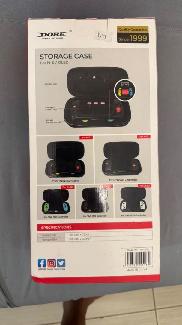 DOBE Storage Case for Nintendo Switch N-S/OLED (Category: Cases & Covers) located in Taguig. Submitted by aaron.d28 (Listing ID 1462426853, Image 2). Description: - DOBE Black Storage Case for Nintendo Switch & Switch OLED - Holds console, toy pad, and game cards - Features a convenient handle for easy carrying - Protects your Nintendo Switch and accessories - Keeps everything organized and tidy - Ideal for travel or home storage.
