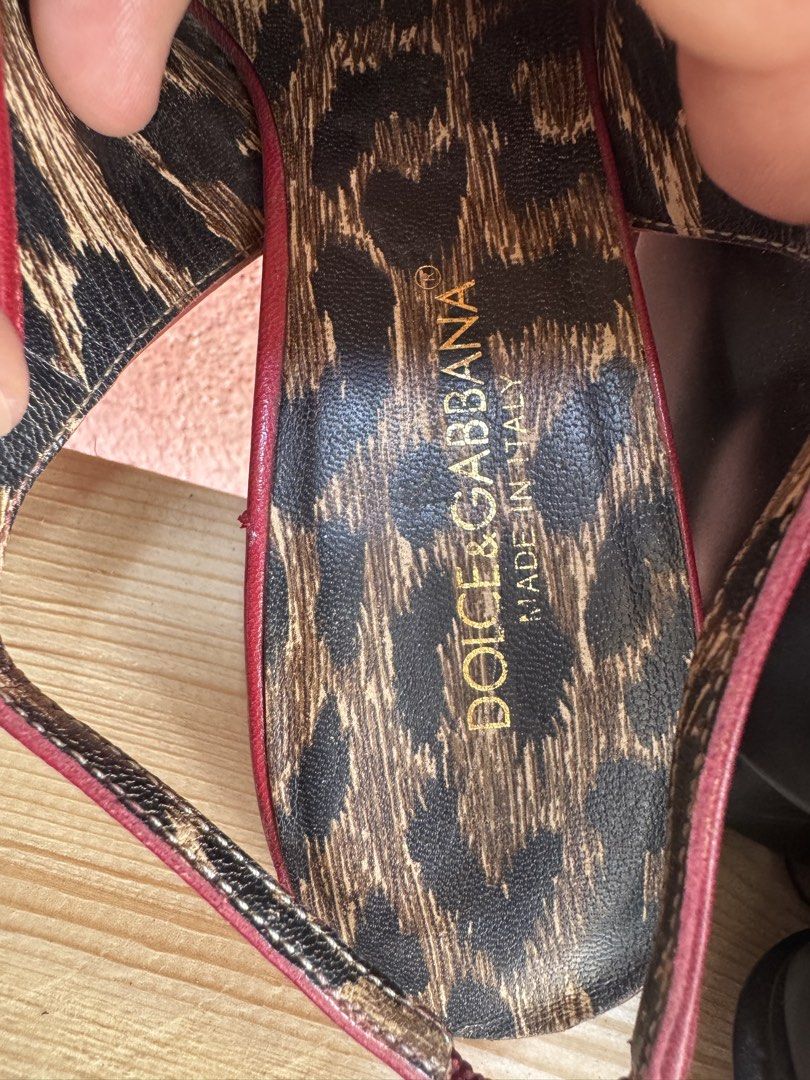 Dolce Gabbana 100% authentic (Category: Sandals) located in Manila. Submitted by wildbear.e10374 (Listing ID 1462298457, Image 2). Description: Dolce Gabbana made in Italy Maron Color with black and with high heels Signed of used it’s normal for sandal It’s Original leather made Italy with barcode. Leather still good..
