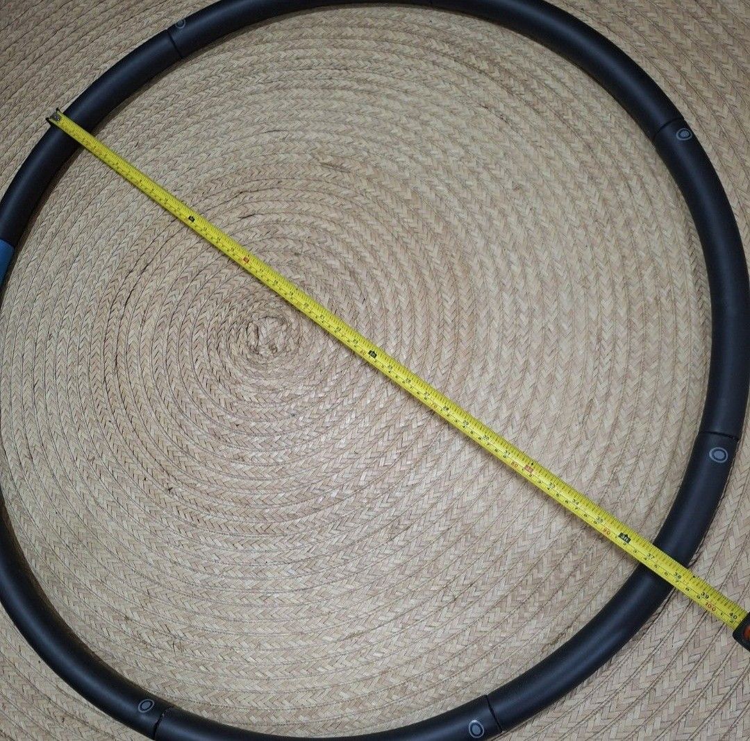 Domyos Weighted Hula Hoop (Category: Toning & Stretching Accessories) located in Pasig City. Submitted by sporty.fit (Listing ID 1462361182, Image 3). Description: - DOMYOS weighted hula hoop - For weight loss and slimming - In perfect condition - Designed for fitness workouts - Black with blue accent - Detachable design for easy storage and transport - Slightly padded for comfort - Hoop diameter: 97 cm - Tube diameter: 94 cm - Weighted hoop weig