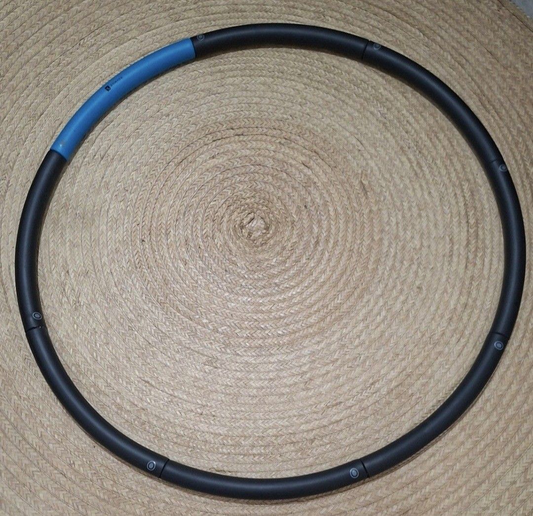 Domyos Weighted Hula Hoop (Category: Toning & Stretching Accessories) located in Pasig City. Submitted by sporty.fit (Listing ID 1462361182, Image 2). Description: - DOMYOS weighted hula hoop - For weight loss and slimming - In perfect condition - Designed for fitness workouts - Black with blue accent - Detachable design for easy storage and transport - Slightly padded for comfort - Hoop diameter: 97 cm - Tube diameter: 94 cm - Weighted hoop weig