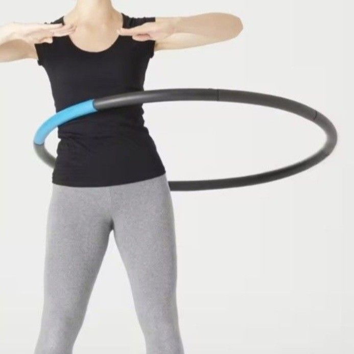 Domyos Weighted Hula Hoop (Category: Toning & Stretching Accessories) located in Pasig City. Submitted by sporty.fit (Listing ID 1462361182, Image 1). Description: - DOMYOS weighted hula hoop - For weight loss and slimming - In perfect condition - Designed for fitness workouts - Black with blue accent - Detachable design for easy storage and transport - Slightly padded for comfort - Hoop diameter: 97 cm - Tube diameter: 94 cm - Weighted hoop weig