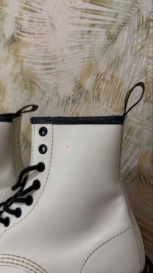 Dr. Martens 1460 White Smooth Leather Boots (Category: Boots) located in Quezon City. Submitted by geeyaay (Listing ID 1462317049, Image 3). Description: * Brand new — never used, just tried on. Unfortunately, it got a little liptint stain while trying it on :) * Flaws: pink stain + fall-off on the upper black part from being stored Original price: ₱7,990.