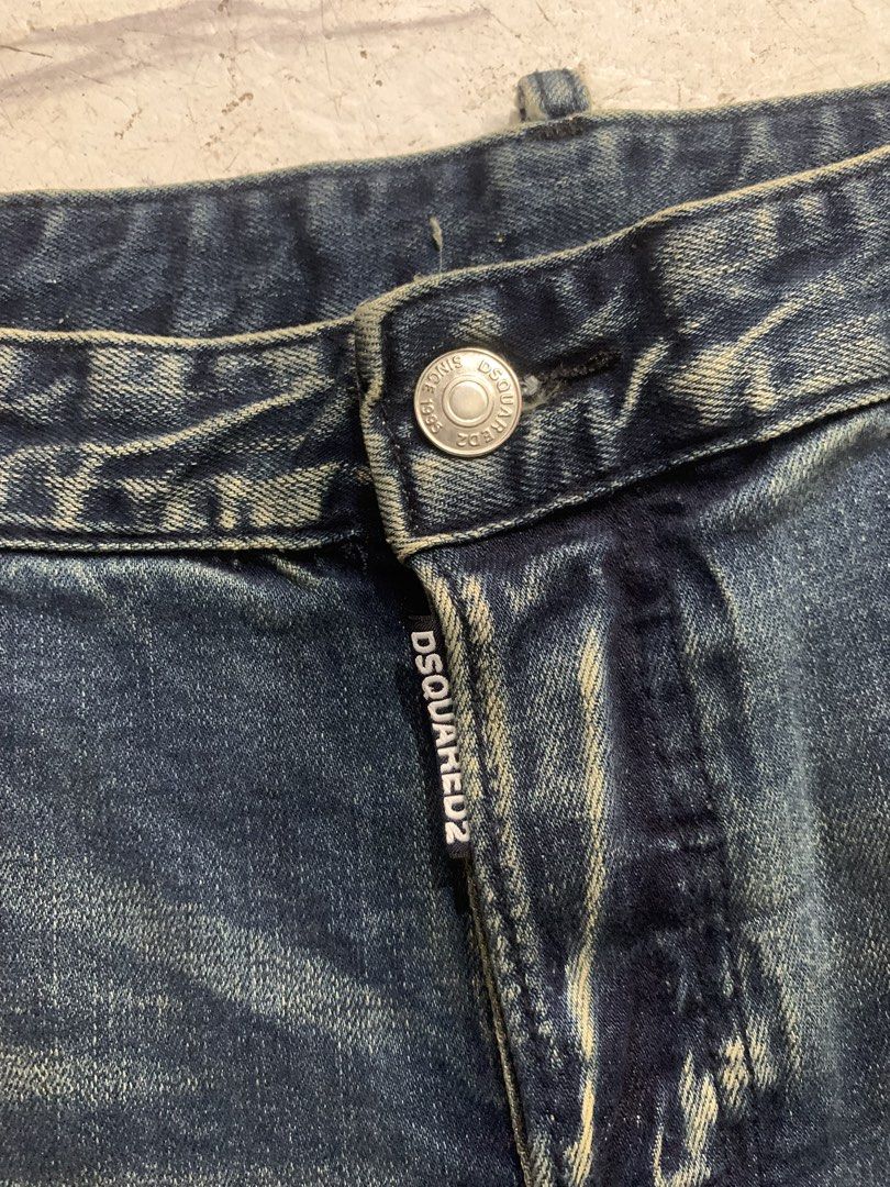 DSQUARED2 Distressed Wash Jeans (Category: Jeans) located in Bacolod City. Submitted by lazythrifts (Listing ID 1462262967, Image 3). Description: - DSQUARED2 jeans - Distressed wash with paint splatters and fading - Button fly closure - Raw hem detail - Perfect for a casual, edgy look - Please check photos for condition details.