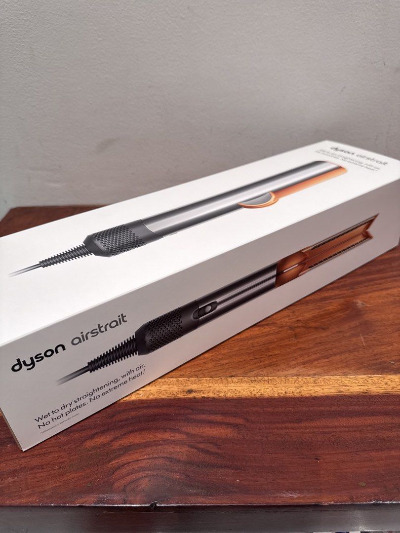 Dyson Airstrait Straightener (Category: Hair) located in Manila. Submitted by altabl123 (Listing ID 1462363766, Image 1). Description: - Dyson Airstrait straightener - Straighten from wet to dry using air, no extreme heat or hot plates - Includes heat-resistant mat - Serial Number: U5X-PH-TJA1764A - Gross weight: 1.88 kg SEALED / BRAND NEW ✨.