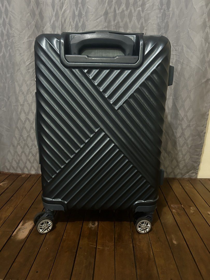 EDDAS Expandable Luggage (Category: Luggage) located in Taguig. Submitted by ghiebow06 (Listing ID 1462377203, Image 3). Description: Dimensions: H- 21 1/2 W- 14 D- 9 (1.5in extra depth) - Dark grey hard shell suitcase - Built-in TSA combination lock for security with key - Smooth rolling spinner wheels for easy maneuverability - Retractable handle for comfortable transport - Spacious interior for all your travel essentials - Durable and stylish 