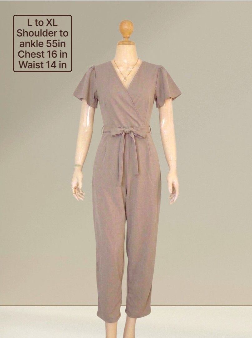 Elegant Khaki Jumpsuit (Category: Jumpsuits) located in Quezon City. Submitted by dannikkishoppe2 (Listing ID 1462387486, Image 1). Description: Elegant Khaki Jumpsuit ❗️₱400❗️ - Flattering flutter sleeves - Secure wrap front with adjustable tie waist - Comfortable wide leg pants - Measurements: Shoulder to ankle 55", Chest 16", Waist 14" - Sizing: Fits L to XL - Versatile for casual outings or dressing up.