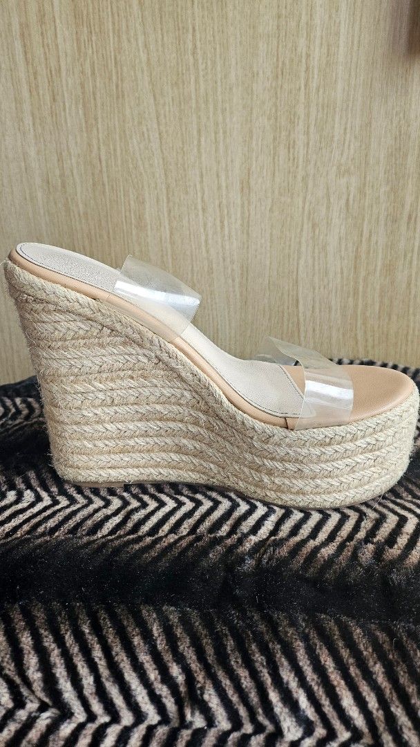 Espadrille Wedge Sandals with Clear Straps (Category: Wedges) located in Makati City. Submitted by shannebun (Listing ID 1462267370, Image 1). Description: Cream espadrille wedge sandals with clear straps and jute rope sole. Easy slip-on style, perfect for any outfit..