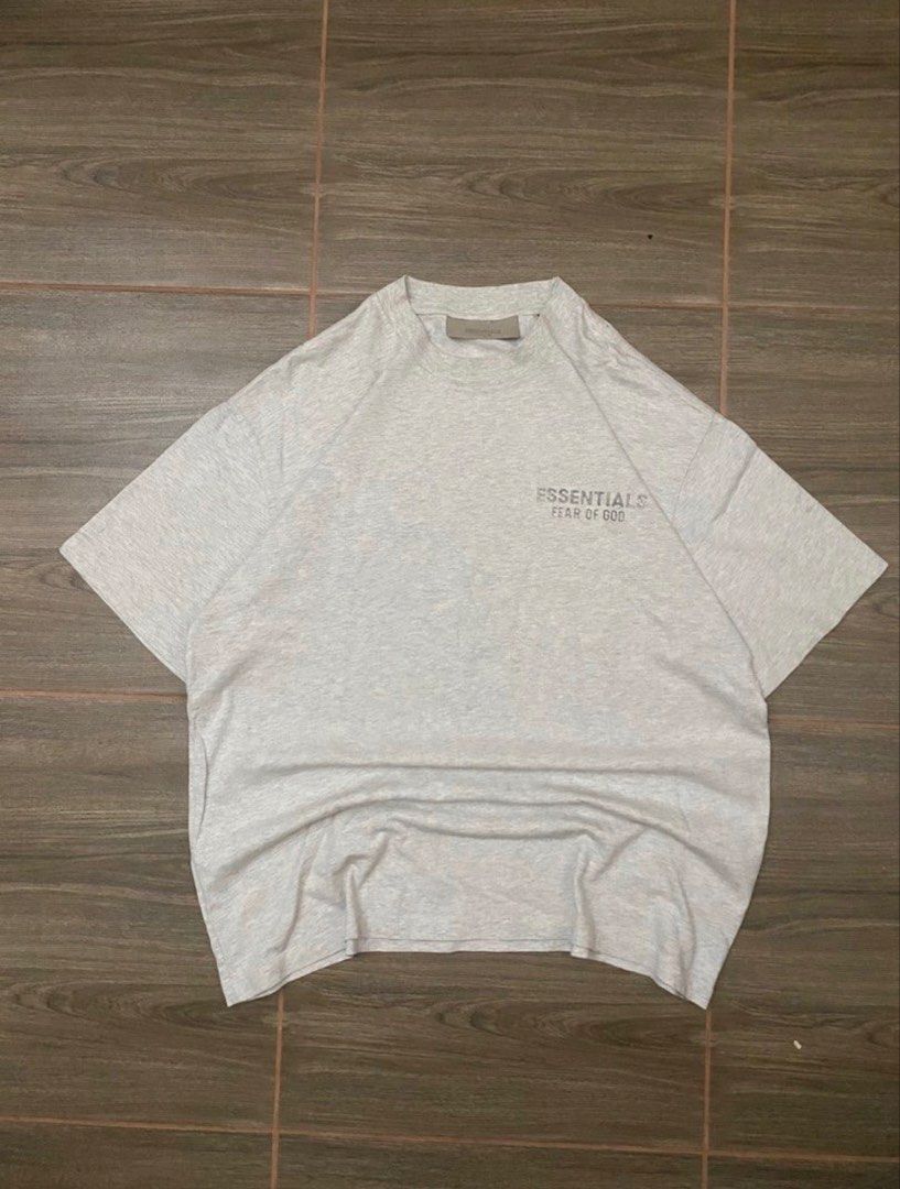 Essentials S22 Light Oatmeal Shirt (Category: Luxury Apparel) located in Masbate. Submitted by abcclothingdepartment (Listing ID 1462344791, Image 2). Description: Good condition Issue minimal holes in back letters ( Shown on last 3 pictures ) 22x28 500 negotiable.