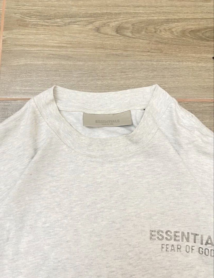 Essentials S22 Light Oatmeal Shirt (Category: Luxury Apparel) located in Masbate. Submitted by abcclothingdepartment (Listing ID 1462344791, Image 3). Description: Good condition Issue minimal holes in back letters ( Shown on last 3 pictures ) 22x28 500 negotiable.