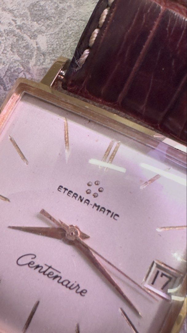 Eterna-matic Centenaire Automatic Watch （分類：手錶）位於 Hong Kong。 由 paul_ip2020 提交（商品編號 1462395287，圖片 2）。簡介： This is a vintage Eterna-Matic Centenaire square automatic watch. Watch DetailsBrand: Eterna (specifically from their “Eterna-Matic” automatic line). Model: Centenaire (Reference 765 series)Era: Produced around 1959–1962 Case Material: 18K Solid Gold measuring approximately 30mm x 30mmx9 mm Movement: Swiss automatic mechanical caliber (typicall