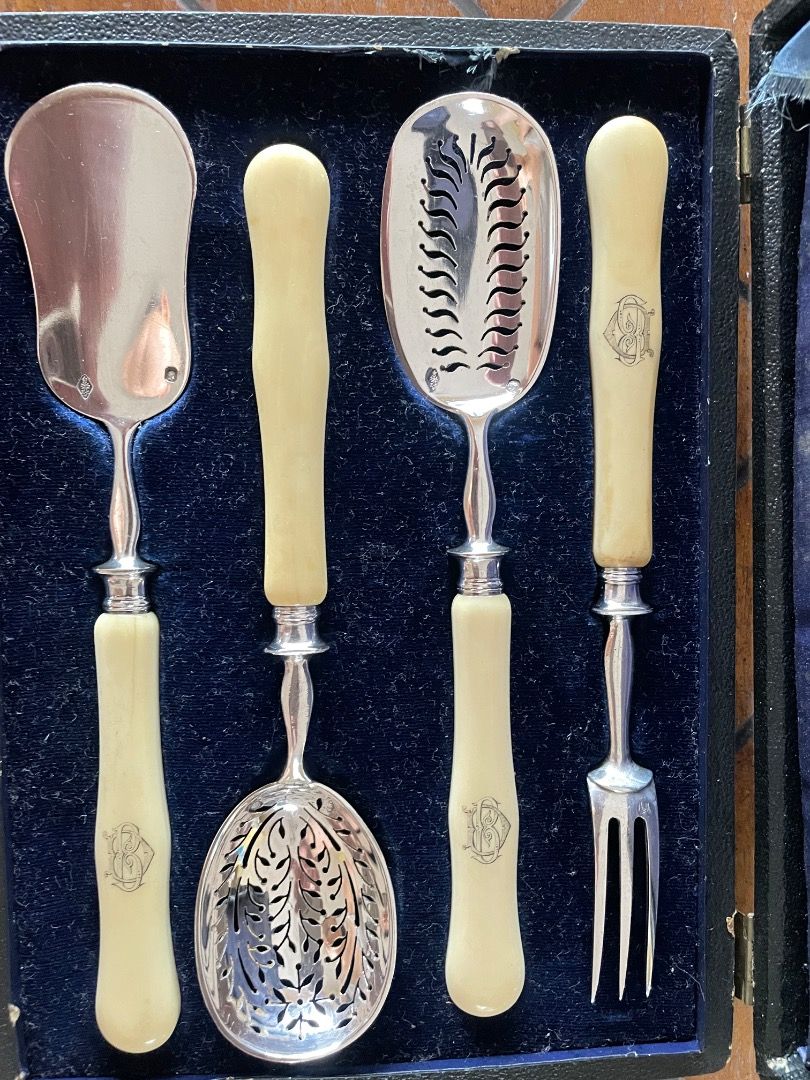 Exceptional Appetizer Serving Set (Category: Luxury Accessories) located in Caloocan City. Submitted by eu_antiques53 (Listing ID 1462367000, Image 2). Description: - Made in Sterling Silver of the great master Cardeilhac supplier to the King and Emperor. - With carved ivory handles. - Monogram DB - Hallmark Minerve 1e Titre - Hallmark silversmith E.C. with crescent below and a crowned honorary cross for Armand - Edouarf Cardeihac inscribed in 18