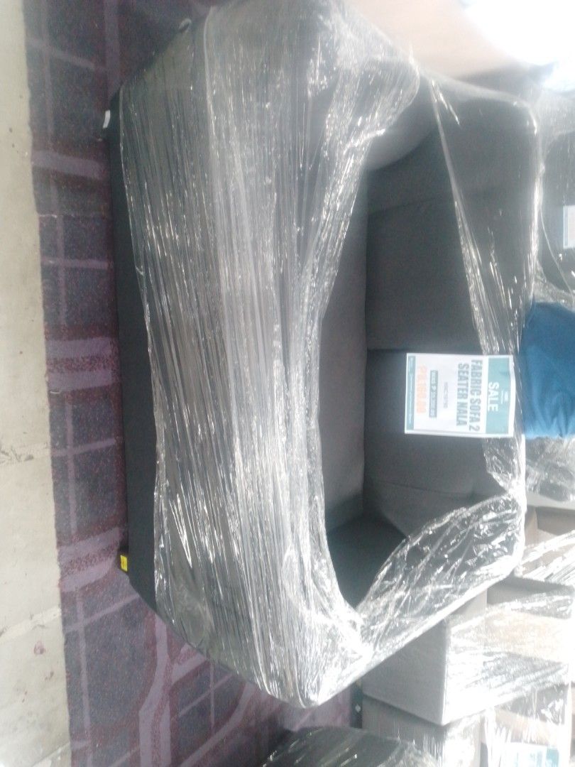 Fabric Sofa 2 Seater (Category: Sofas) located in Manila. Submitted by maryjane09. (Listing ID 1462290810, Image 1). Description: - Brand new 2-seater fabric sofa - Color: Dark Grey - Still wrapped in original plastic - Ideal for small apartments or rooms - Original price tag: PHP 10,999.00.