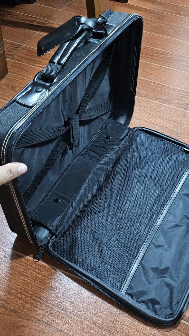 FERNAND RAZZINI Black Business Bag (Category: Briefcases) located in Cavite. Submitted by sunghanphil_31 (Listing ID 1462278721, Image 3). Description: - Brand: FERNAND RAZZINI - Color: Black - Features: Multiple interior compartments for organization - Ideal for: Work or travel - Condition: Good overall shape with minor exterior scuffs - Functionality: Zippers work well, sturdy handle - Includes: Luggage tag.
