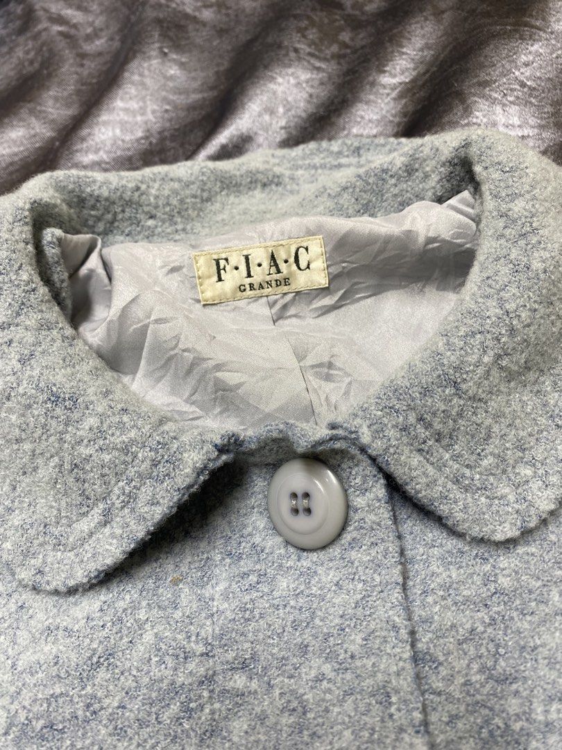 FIAC GRANDE Light Blue Button-Up Jacket (Category: Coats, Jackets and Outerwear) located in Agdangan. Submitted by kevinthriftshop (Listing ID 1462391776, Image 2). Description: - Light blue FIAC GRANDE jacket - Button-up front with rounded collar - Material: 65% Wool, 35% Rayon (wool blend) - Size: Medium - Ideal for layering.