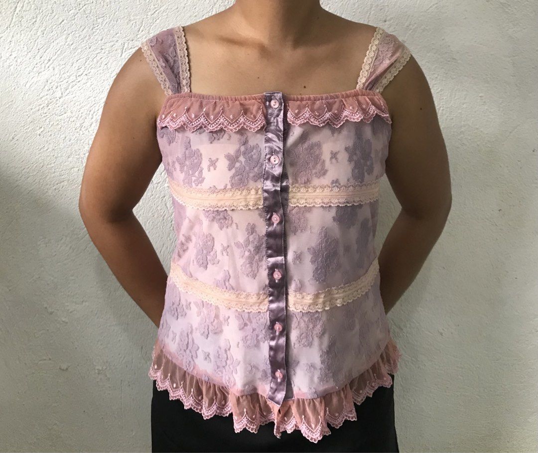 Floral Lace, Camisole Top (Category: Sleeveless) located in Davao. Submitted by mira_e02 (Listing ID 1462316628, Image 2). Description: Minimal issues: some stains on the inner lining, but overall no damage to the fabric. The actual color of this cami is in the picture slides 1-3. .