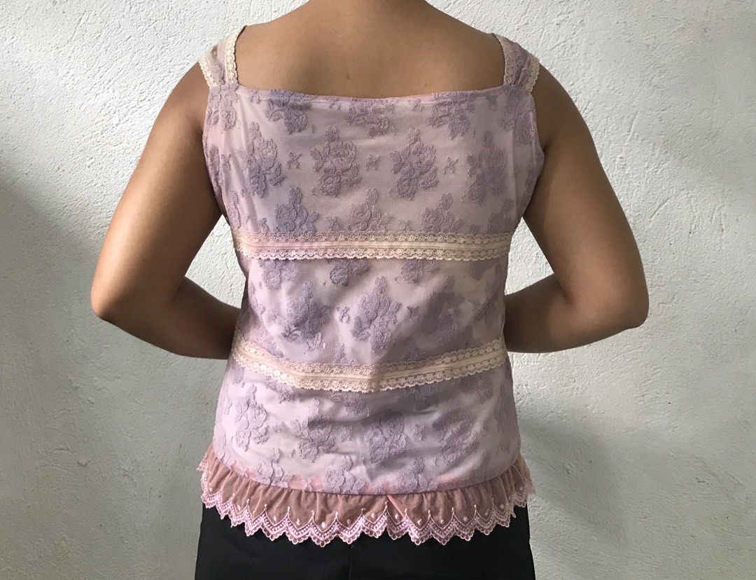 Floral Lace, Camisole Top (Category: Sleeveless) located in Davao. Submitted by mira_e02 (Listing ID 1462316628, Image 3). Description: Minimal issues: some stains on the inner lining, but overall no damage to the fabric. The actual color of this cami is in the picture slides 1-3. .