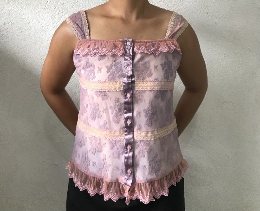 Floral Lace, Camisole Top (Category: Sleeveless) located in Davao. Submitted by mira_e02 (Listing ID 1462316628, Image 1). Description: Minimal issues: some stains on the inner lining, but overall no damage to the fabric. The actual color of this cami is in the picture slides 1-3. .