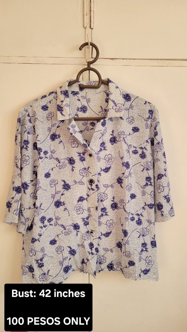 Floral Print Blouse - 42 inch Bust (Category: Blouses) located in Bacoor. Submitted by itsmereyyy (Listing ID 1462314719, Image 1). Description: - Light blue blouse - Purple floral print - Collared neckline - Button-down front - 3/4 length sleeves - Bust: 42 inches - Ideal for casual wear.