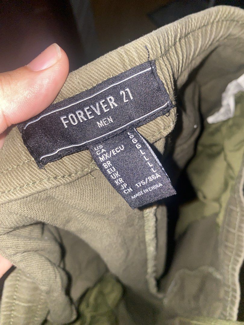 Forever 21 Men Olive Green Cargo Pants (Category: Jeans) located in Cagayan de Oro. Submitted by brokylee (Listing ID 1462380257, Image 2). Description: FOR SALE: 🛍️ Forever 21 Olive Green Twill Button-Hem Cargo Joggers ₱500 Condition: 8/10 Size: US Large Waist: 35 in RFS: Decluttering 📍 Meet-ups: SM Mall of Asia (Pasay) Pasay Area Lalamove.