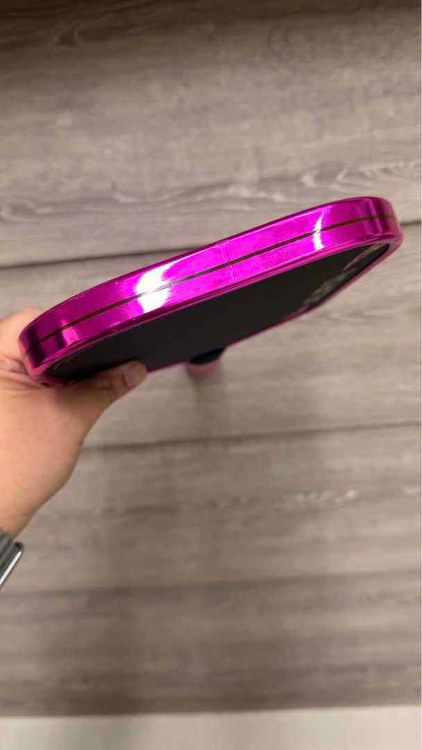 FRIDAY Aura Pro Metallic Pink (Category: Racket and Ball Sports) located in Bustos. Submitted by krnmrms (Listing ID 1462285168, Image 2). Description: Friday Aura Pro (Metallic Pink) - Condition 9.5/10 - no issues/scratches - covered with clear edge tape and overgrip (cookiegrips) since day 1 - with original paddle cover - 16mm Gen 4 Power Paddle.