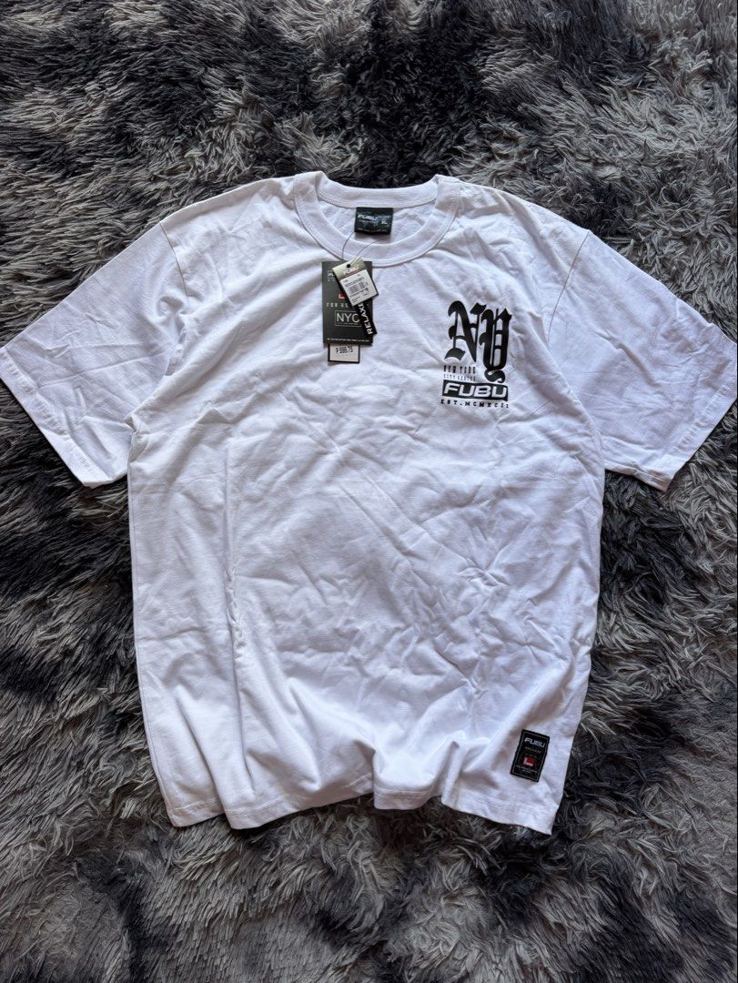 FUBU NY SHIRT (Category: Tshirts & Polo Shirts ) located in Santiago. Submitted by findsbyjew (Listing ID 1462376505, Image 1). Description: Brandnew fubu shirt selling below the price 💌 slightly nego rfs: too big can do shipping nationwide via jnt! Loc: Isabela.
