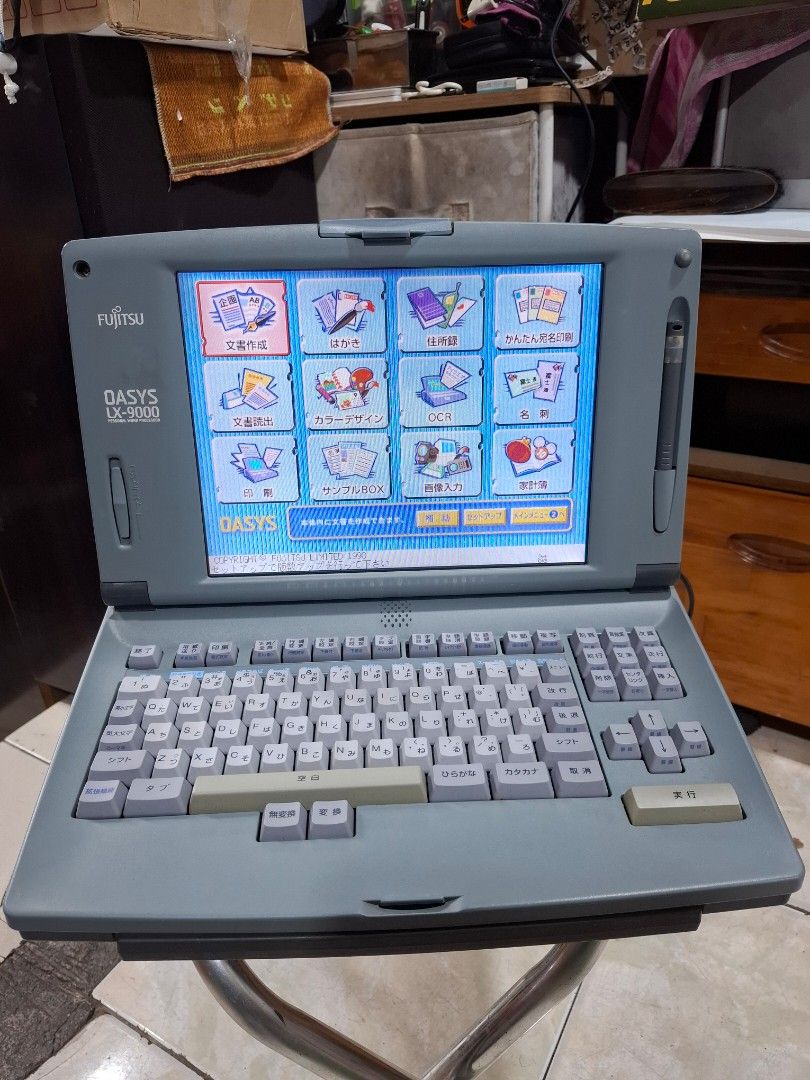 Fujitsu OASYS LX-9000 Portable Word Processor (Category: Laptops & Notebooks) located in Santa Rosa. Submitted by echojapansurplus_01 (Listing ID 1462401952, Image 1). Description: - Vintage Fujitsu OASYS LX-9000 word processor - Portable unit with integrated keyboard and screen - Features Japanese characters on keys and interface - Displays document and editing functions - Power adapter not shown, but likely required - Ideal for collectors or fa