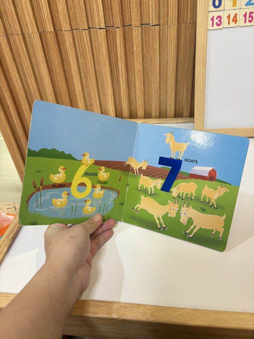 Fun With Numbers Board Book - Farm Animals (Category: Children's Books) located in Quezon City. Submitted by sailormooooo (Listing ID 1462389256, Image 2). Description: - Fun board book for learning numbers. - Features colorful farm animal illustrations (cows, chickens, ducks, goats). - Each page shows a number with matching animals. - Thick, durable pages safe for small hands. - Ideal for early learning and counting practice..