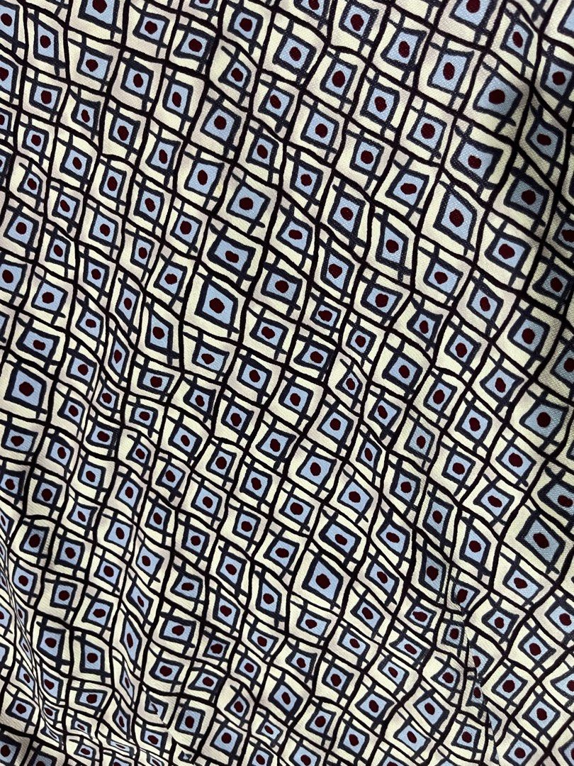 Geometric Print A-Line Skirt (Category: Skirts) located in Mandaluyong City. Submitted by hopeworldplane (Listing ID 1462419701, Image 2). Description: - Stylish A-line skirt - Eye-catching geometric pattern - Colors: Blue, white, and dark blue - Fabric with a subtle sheen - Comfortable pull-on style with elastic waistband - Versatile for casual or semi-formal outfits.
