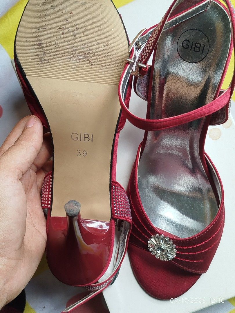 GIBI Khissy Red Wine Heels Size 39 (Category: Heels) located in Las Pinas. Submitted by papatoes (Listing ID 1462295837, Image 3). Description: - Brand: GIBI - Model: Khissy Heels - Color: Wine - Size: 39 - Style: Open-toe heels - Closure: Ankle strap with buckle - Embellishment: Sparkly gem on the front - Heel Height: Moderate (3-inch) - Occasion: Perfect for dressing up any outfit used twice rfs decluttering .