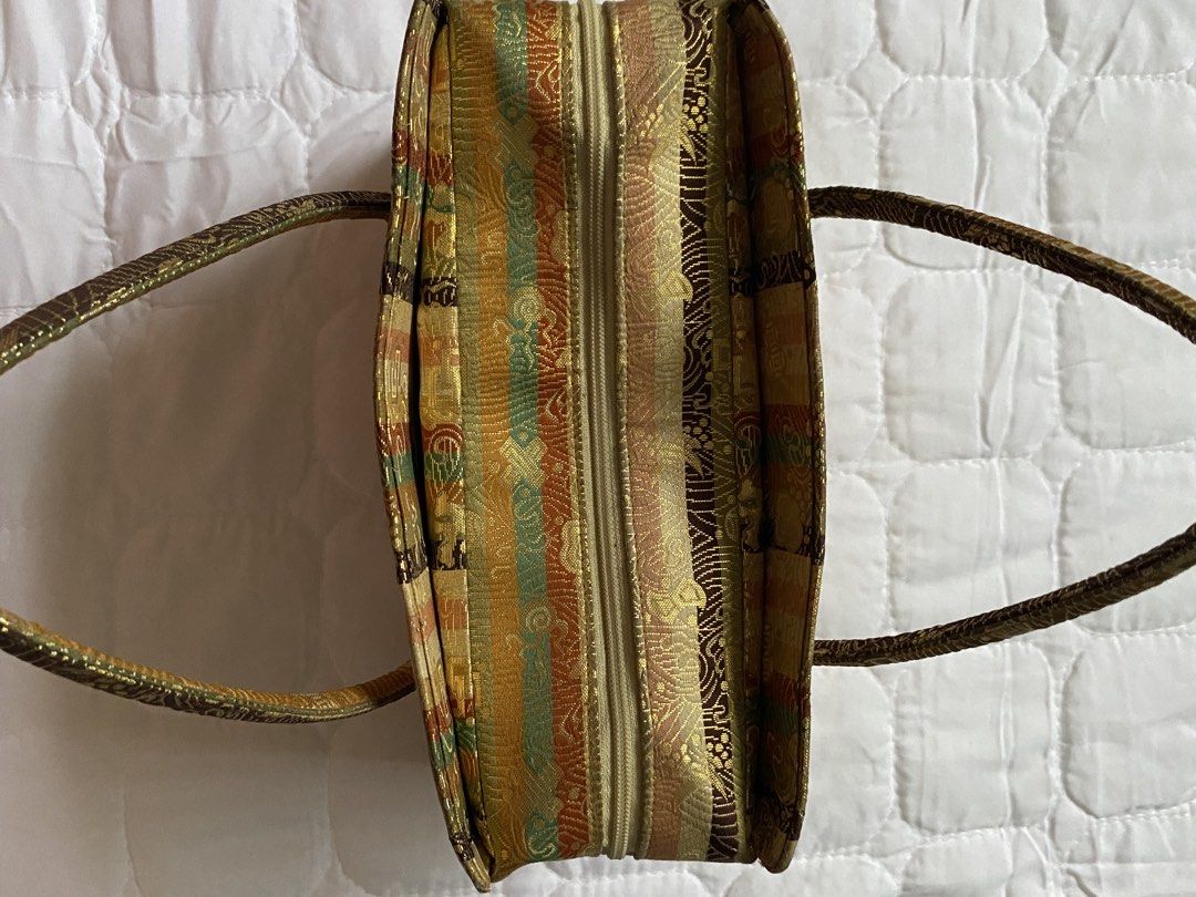 gilded mosaic - gold patterned handbag (Category: Purses & Pouches) located in Quezon City. Submitted by brattybabe (Listing ID 1462328279, Image 3). Description: Color may vary due to lighting Dimes: W: 9.5 in. L: 6 in. 💳 Mode of payment: GCash, Paymaya, Metrobank, Maribank 🚚 Courier: Lalamove, Grab Padala, J&T, or Toktok only. 🫶🏻 The buyer is responsible for the shipping cost. 💲 Payment first before shipping the item. ⛔️ Note: I do not acc