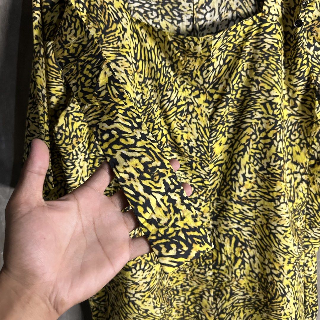 Givenchy - Animal Print Dress (Category: Luxury Apparel) located in Tayabas. Submitted by streetdepartment (Listing ID 1462265452, Image 3). Description: Givenchy - Animal Print Dress Measurements (inches): Width: 20.5” Length: 35” Shoulder: 15.5” Sleeves: 12.5” Tagged as 40 Excellent condition Flaw/s: kindly check last picture.