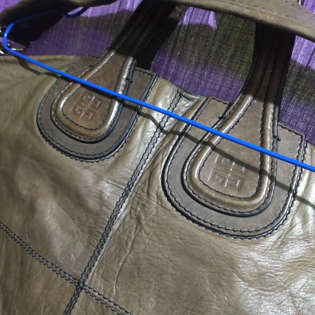 Givenchy sugar goat skin Nightingale bag large (Category: Luxury Bags & Wallets) located in Zamboanga. Submitted by _oliverbmth (Listing ID 1460056757, Image 3). Description: - Authentic Givenchy Nightingale tote bag - Color: Olive green - Material: Genuine leather - Style: Slouchy, relaxed silhouette - Features: Signature Givenchy logo embossed on handles - Interior: Ample space for essentials - A classic and versatile designer piece - No issue 