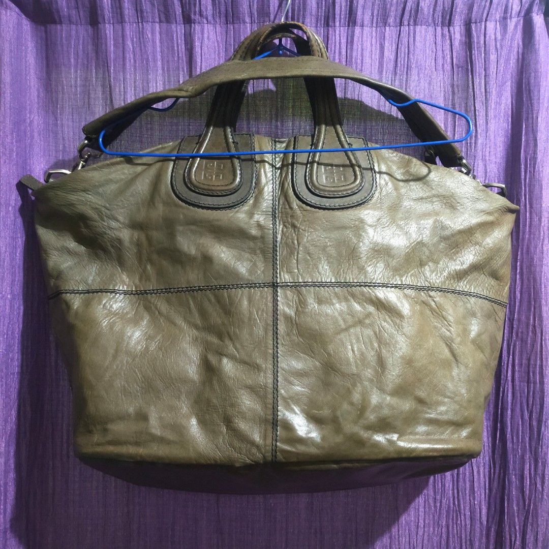 Givenchy sugar goat skin Nightingale bag large (Category: Luxury Bags & Wallets) located in Zamboanga. Submitted by _oliverbmth (Listing ID 1460056757, Image 1). Description: - Authentic Givenchy Nightingale tote bag - Color: Olive green - Material: Genuine leather - Style: Slouchy, relaxed silhouette - Features: Signature Givenchy logo embossed on handles - Interior: Ample space for essentials - A classic and versatile designer piece - No issue 