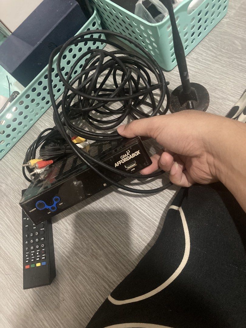 GMA Affordabox Digital TV Receiver with Remote (Category: TV Parts & Accessories) located in Navotas City. Submitted by keenpenguin_13f502 (Listing ID 1462358242, Image 1). Description: - GMA Affordabox Digital TV Receiver - Includes original box and remote control - Comes with AV cables for easy connection - Power cord included - Tested and working well - Everything you need for setup.