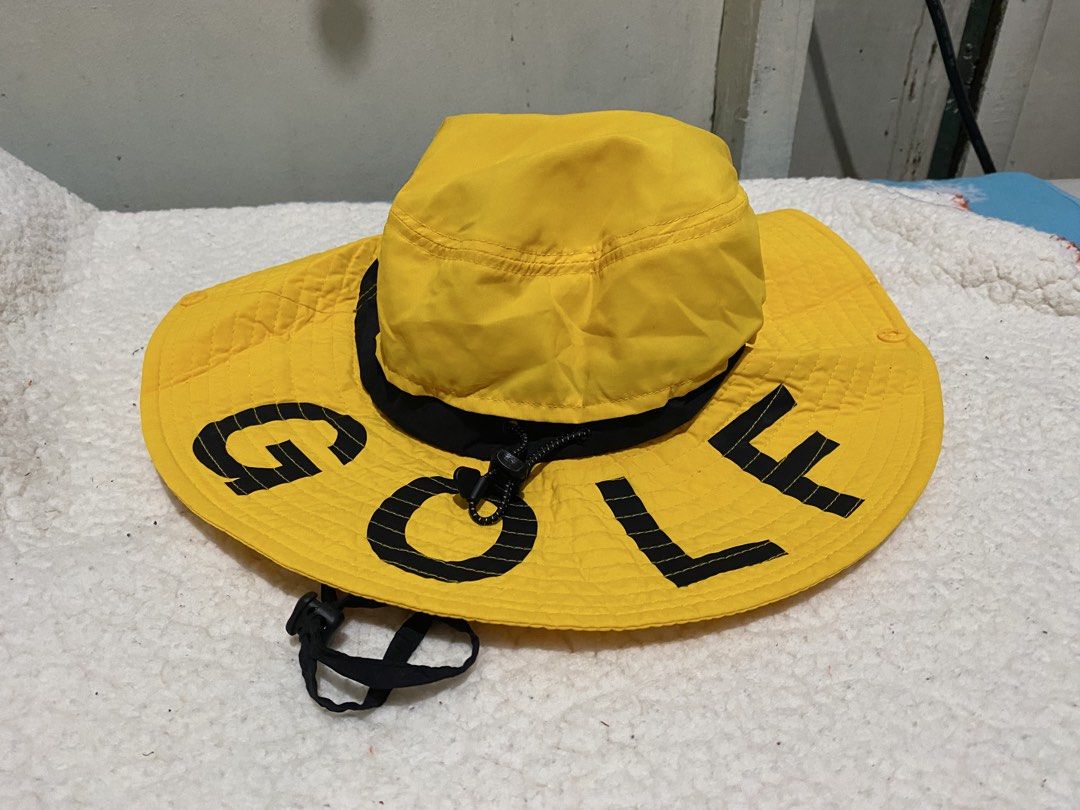 Golden Bear Yellow Golf Bucket Hat (Category: Hats & Beanies) located in Manila. Submitted by resi.diaz (Listing ID 1462428308, Image 2). Description: - Yellow bucket hat from Golden Bear - 'GOLF' printed on the brim - Adjustable chin strap for a secure fit - Mesh lining inside for enhanced breathability - Ideal for outdoor activities and sunny weather.