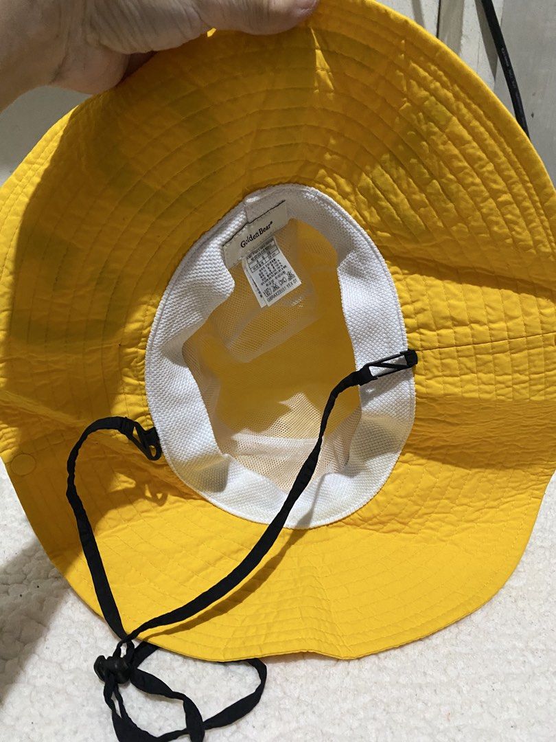 Golden Bear Yellow Golf Bucket Hat (Category: Hats & Beanies) located in Manila. Submitted by resi.diaz (Listing ID 1462428308, Image 3). Description: - Yellow bucket hat from Golden Bear - 'GOLF' printed on the brim - Adjustable chin strap for a secure fit - Mesh lining inside for enhanced breathability - Ideal for outdoor activities and sunny weather.