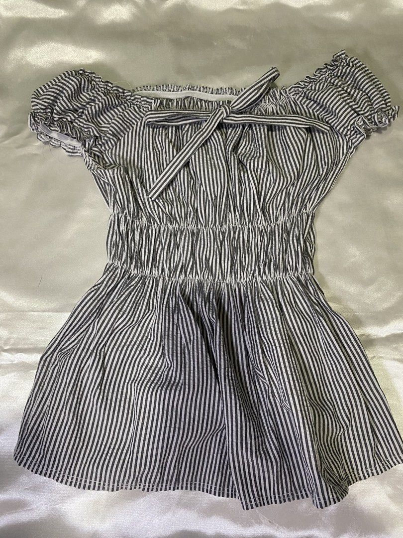 Gray Striped Off-Shoulder Smocked Top (Category: Blouses) located in Rizal. Submitted by ssushimun (Listing ID 1462349271, Image 1). Description: — used once — bought last week — lalamove (sf - depends on the loc) .