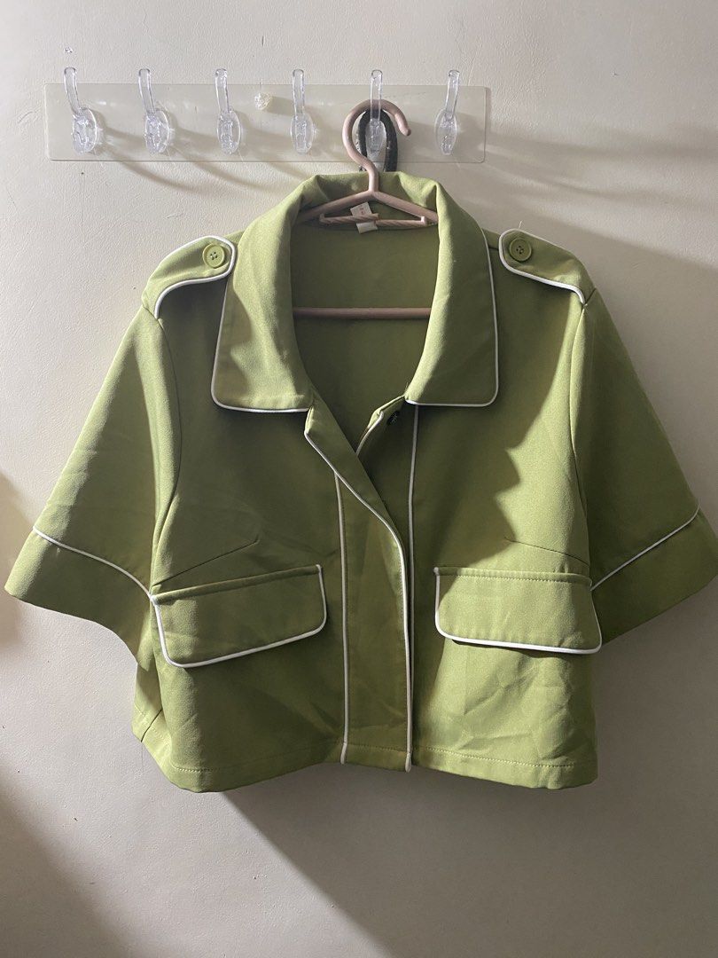Green Cropped Shirt with White Piping (Category: Shirts) located in Manila. Submitted by jiro0628 (Listing ID 1462430973, Image 1). Description: - Adorable green cropped shirt - Short sleeves - Two functional front pockets - Chic white piping details on collar, pockets, and sleeves - Stylish button details on shoulders - Versatile piece, pairs perfectly with high-waisted bottoms.